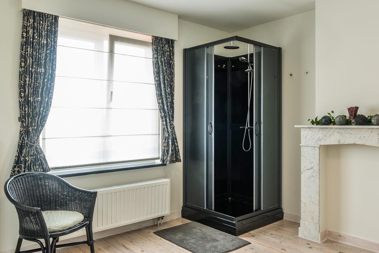 Hotel De Perenboom Belsele Habitación foto